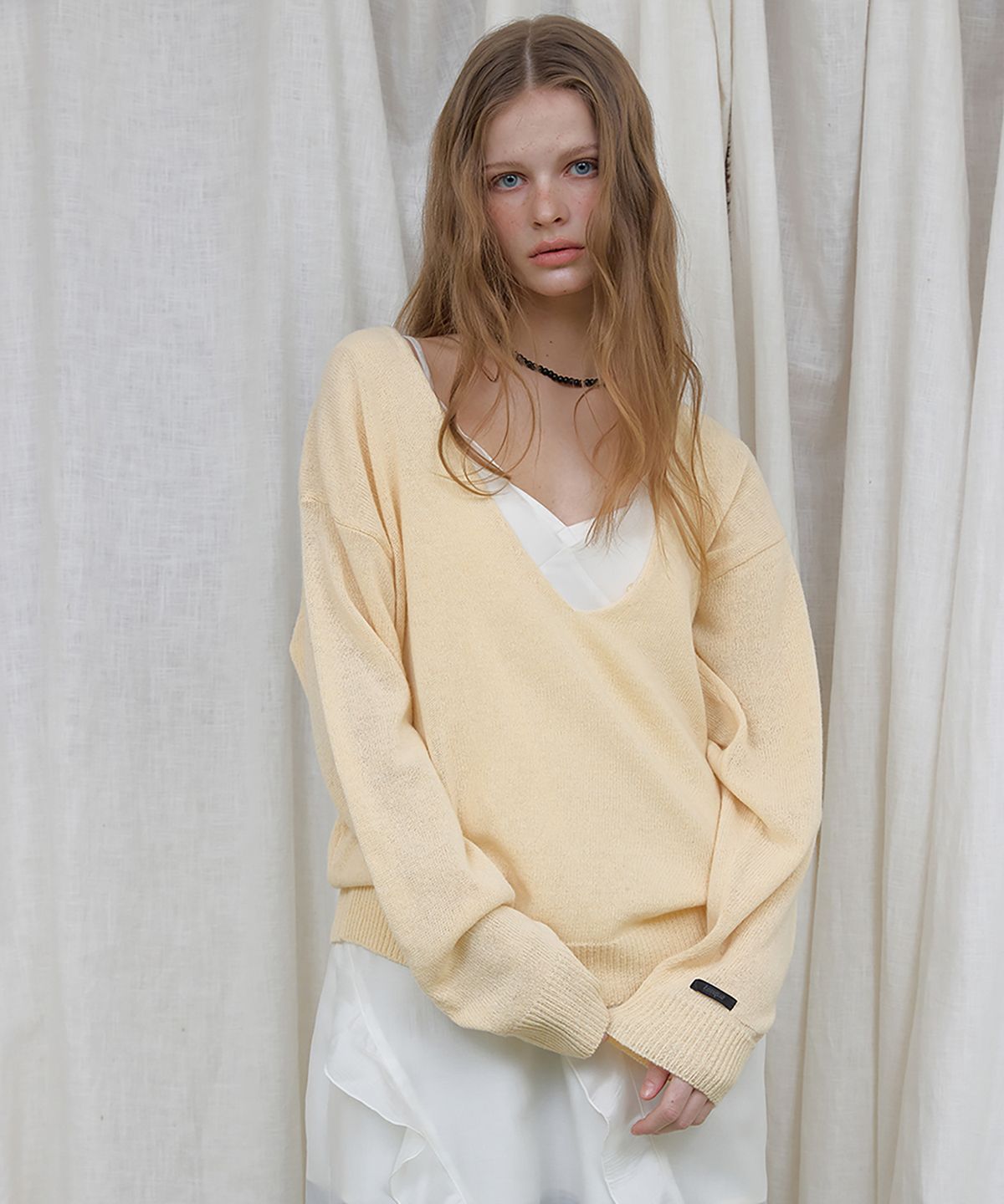 론크(LONQUE) WOOL DEEP V-NECK BUTTON PULLOVER KNIT (BUTTER YELLOW)