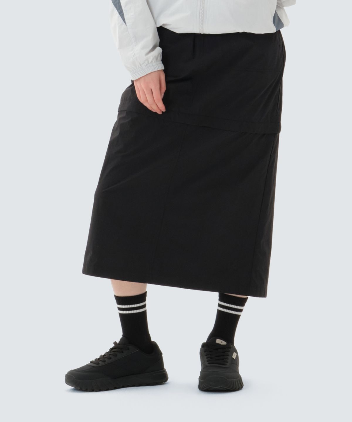 스노우피크 어패럴(SNOWPEAK APPAREL) 경량 타슬란 디테쳐블 스커트 (S26MWLSK55) Black