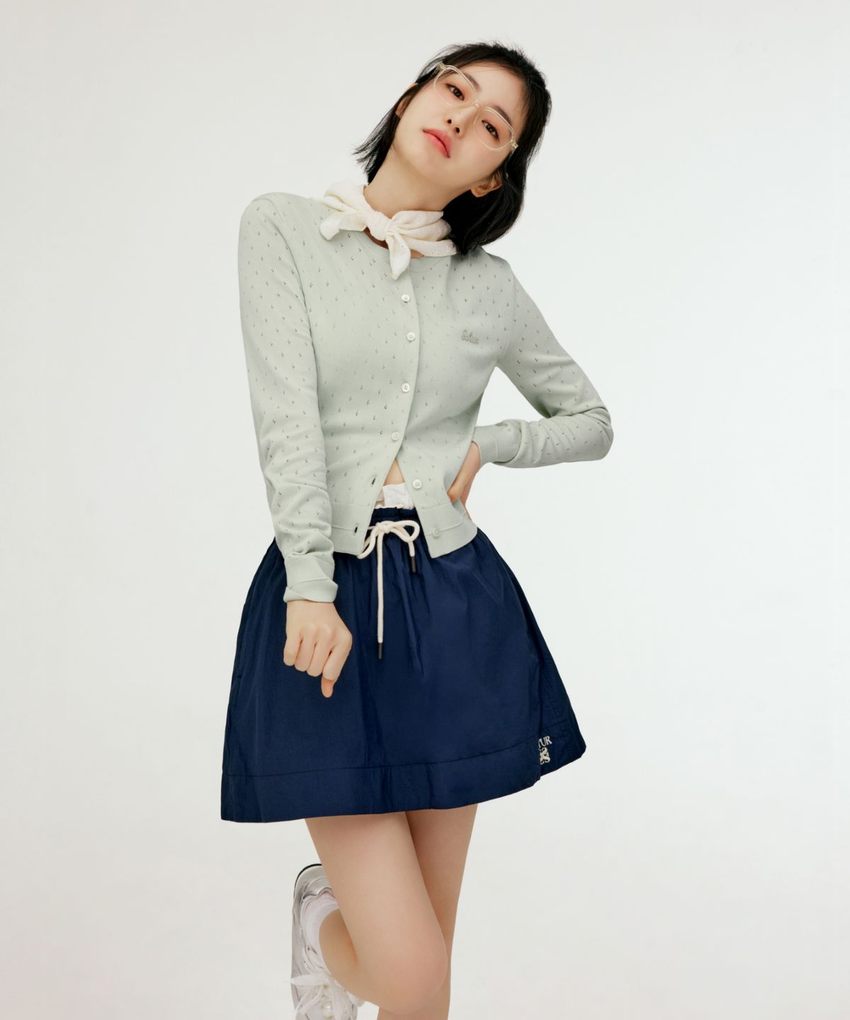 세터(SATUR) (W) 로고 스트링 나일론 플레어 스커트 네이비