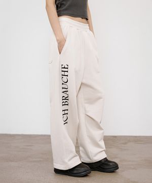 GERMAN LETTERING SWEATPANTS IN IVORY