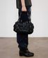 EYELET GLOSSY MINI DUFFLE BAG IN BLACK