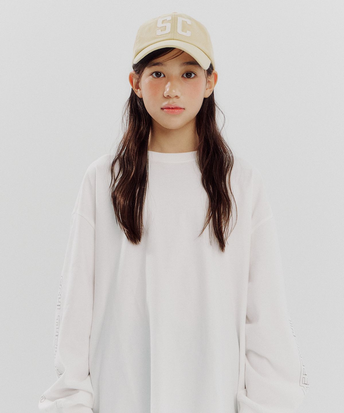 스쿨더키퍼스(SCHLTHEKEEEPERS) 퍼지 긴팔 티셔츠 - 화이트