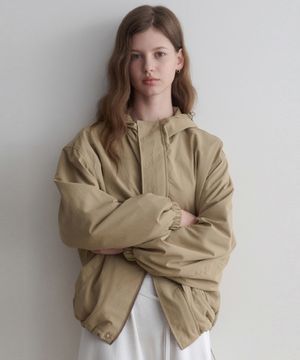 beige hood wind breaker