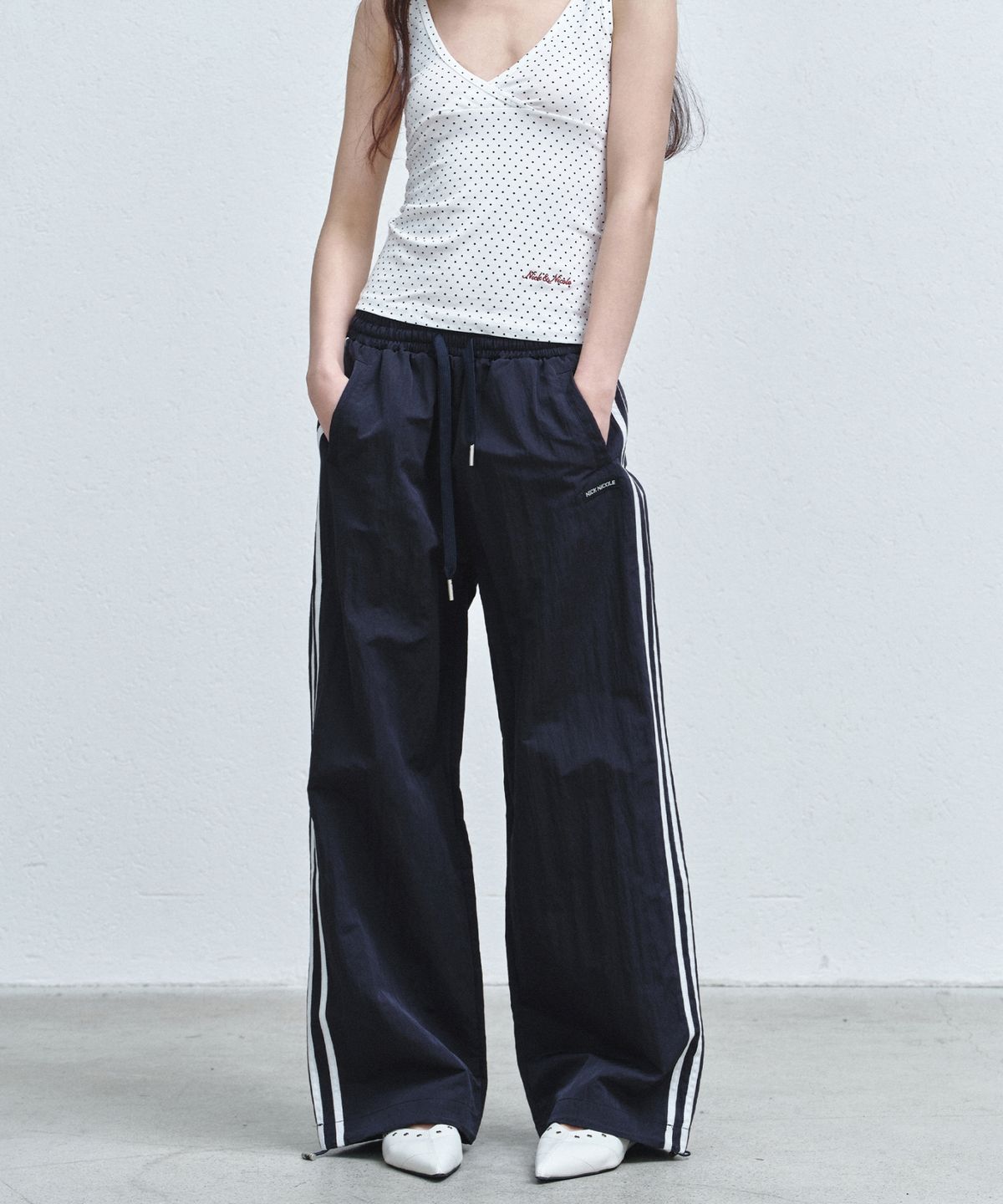 닉앤니콜(NICK&NICOLE) NYLON TRACK PANTS_NAVY