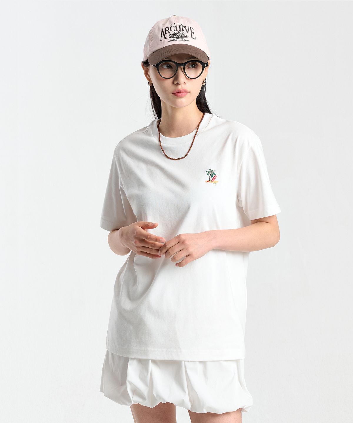 휠라(FILA) 수피마 와펜 반팔티(FS262RS01X028191)