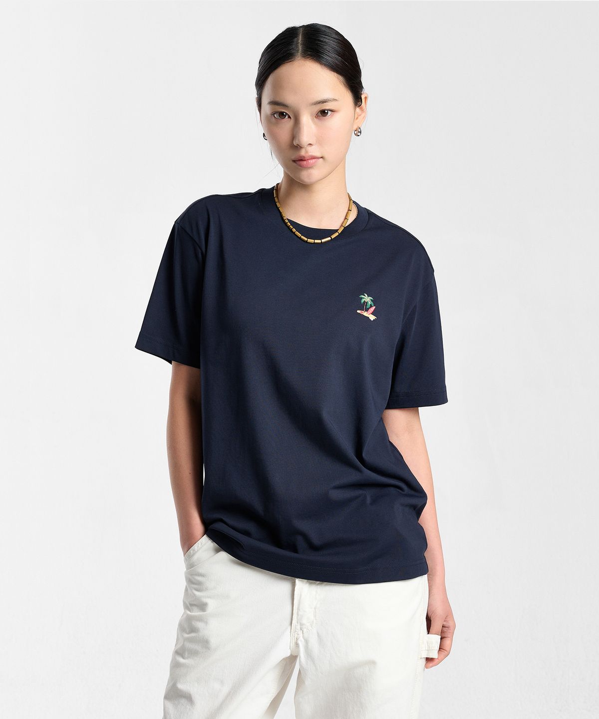 휠라(FILA) 수피마 와펜 반팔티(FS262RS01X028472)