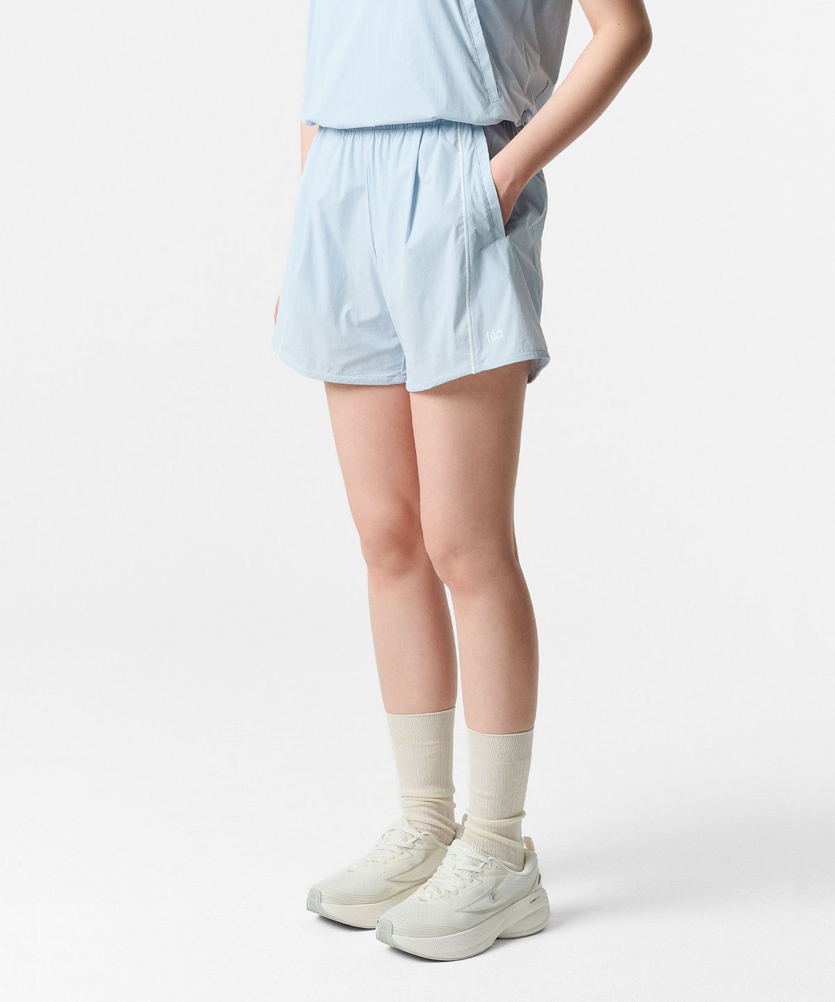 휠라(FILA) Coldwave+ 쿨링 우븐 스트레치 큐롯팬츠(FS262TR02F003442)