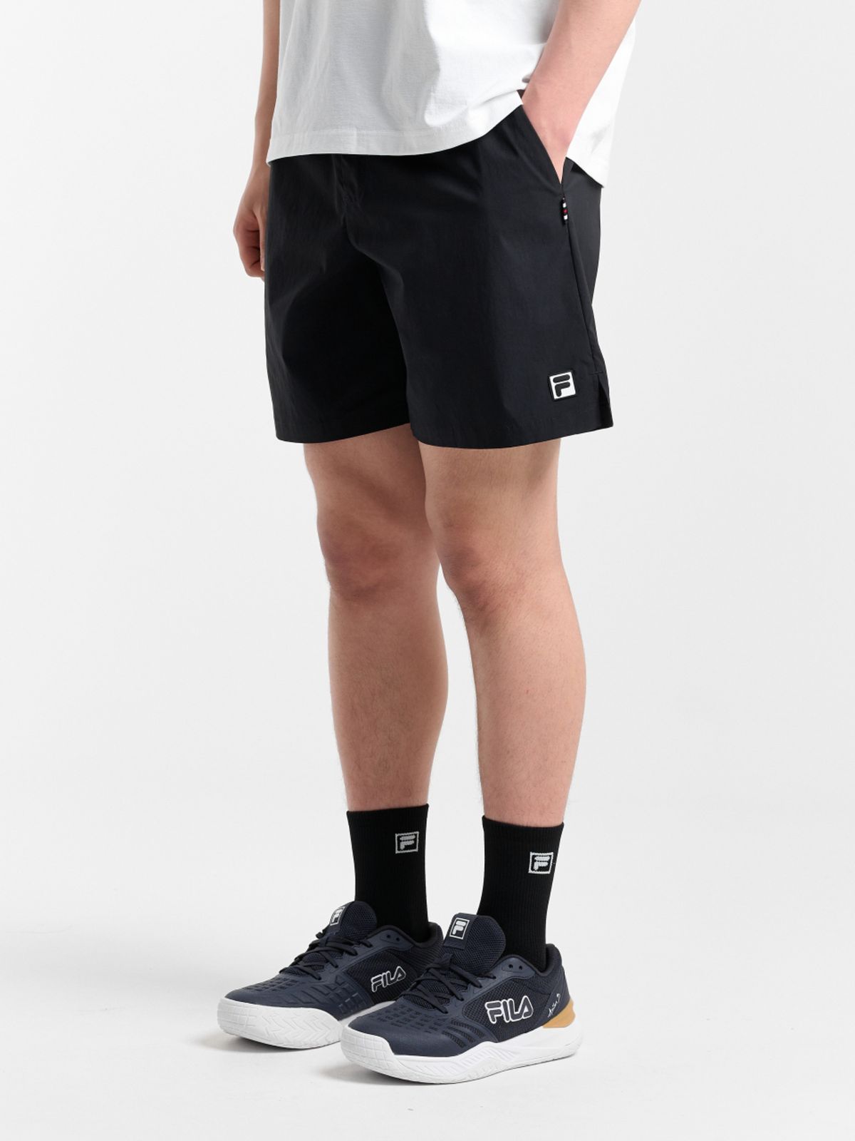 휠라(FILA) 테니스 7부 베이직 쇼츠(FS262TR11M008001)