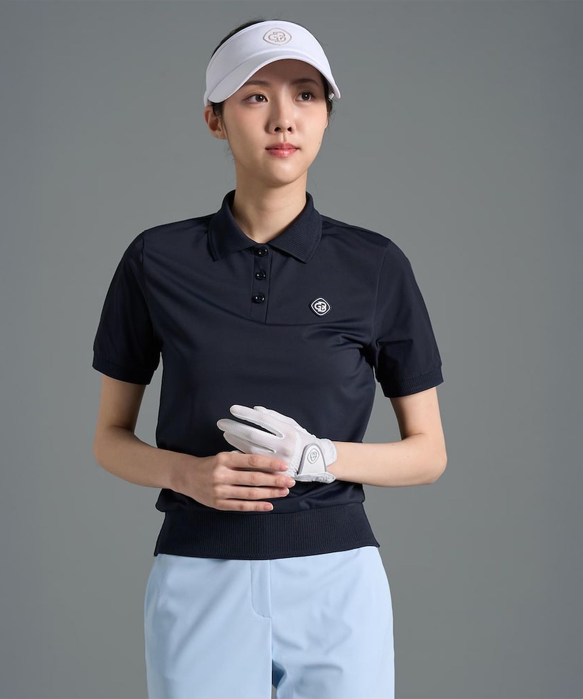 빈폴골프(BEANPOLE GOLF) 여성 로고 타공 칼라 반소매 티셔츠 - 네이비