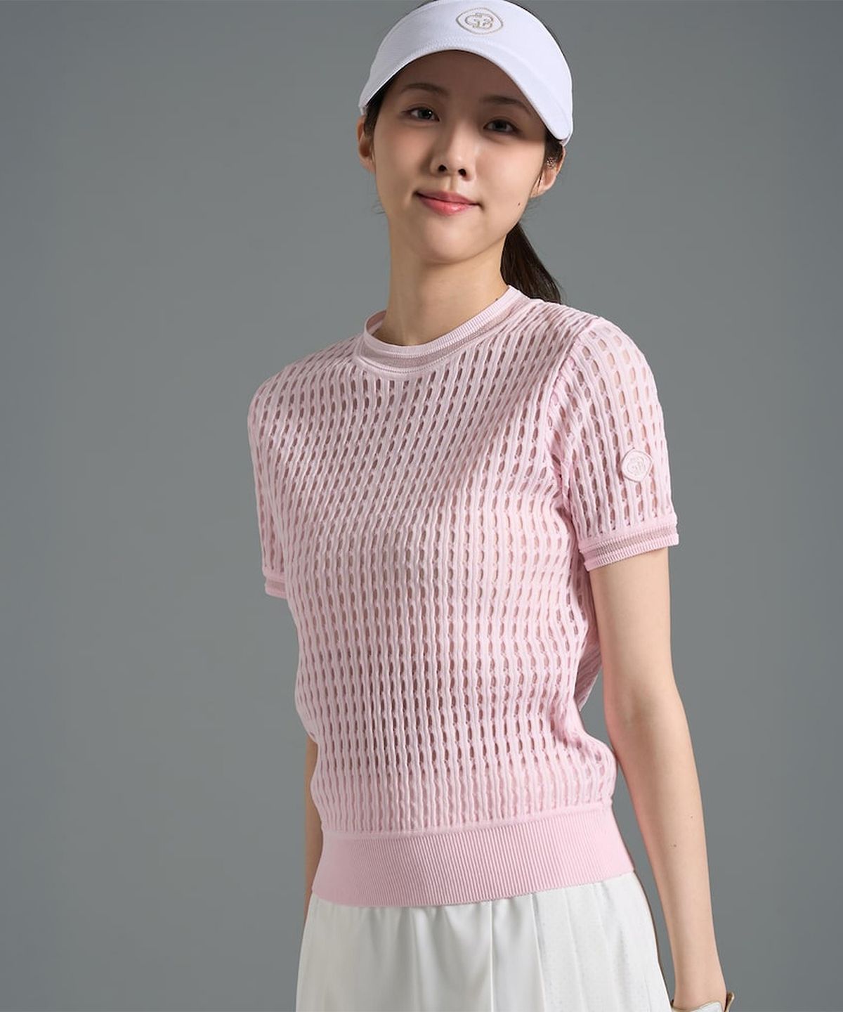 빈폴골프(BEANPOLE GOLF) 여성 변형 케이블 반소매 풀오버 - 라이트 핑크