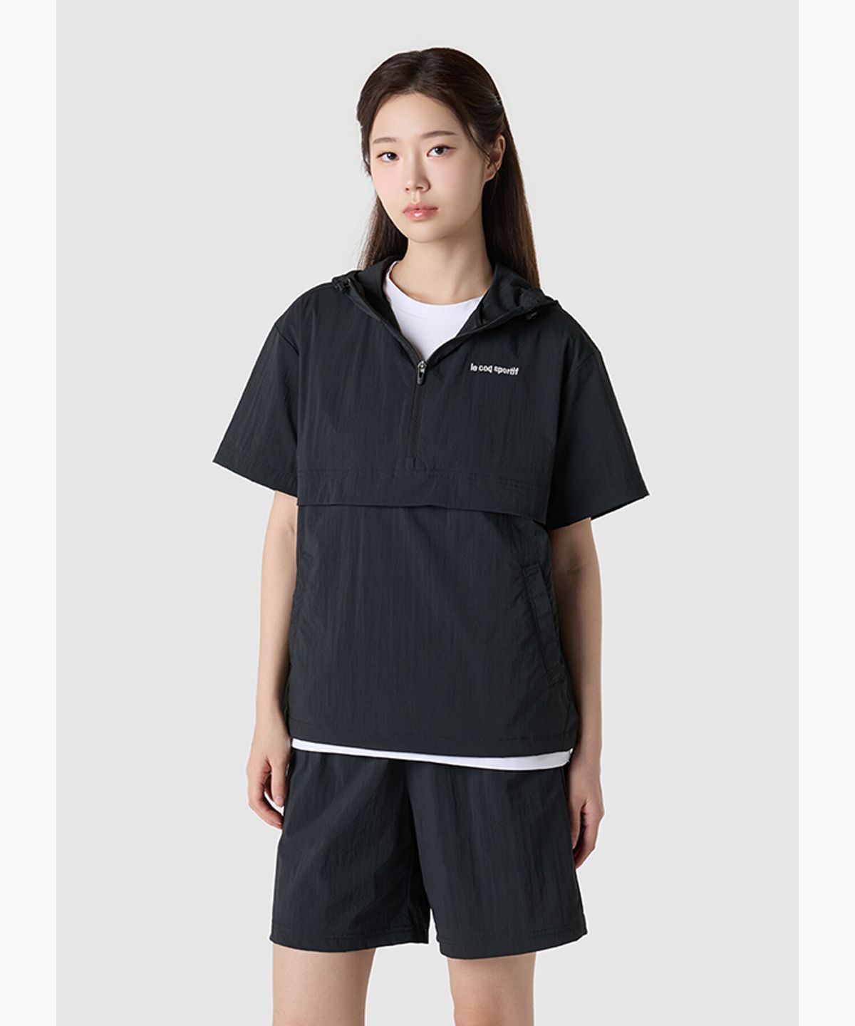 르꼬끄(LECOQ) 유니 스트레치 타슬란 루즈핏 반팔 아노락 자켓 - 블랙 QR223LJK42