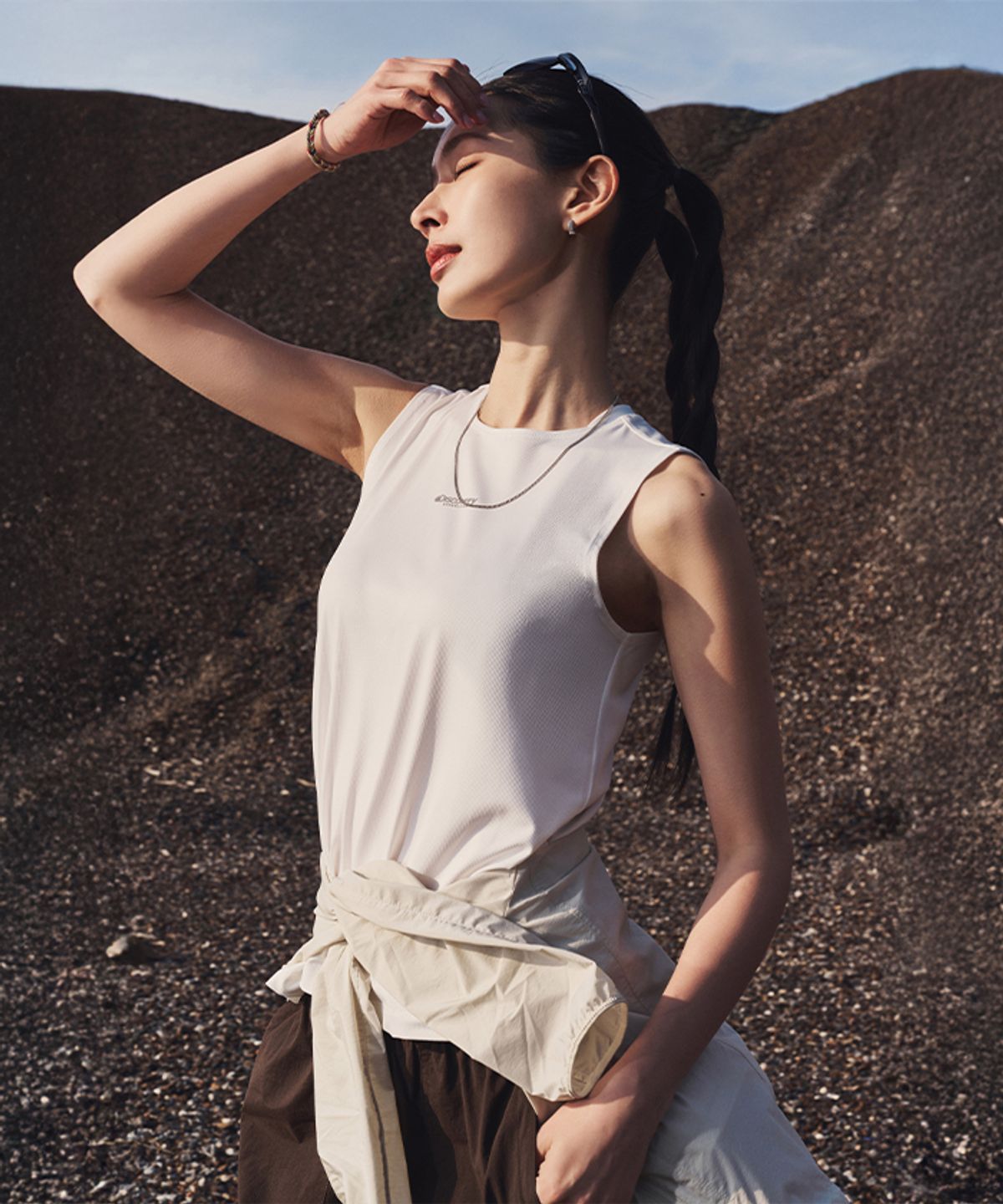 디스커버리 익스페디션(DISCOVERY EXPEDITION) 여성 러닝 슬리브리스 (WHITE)