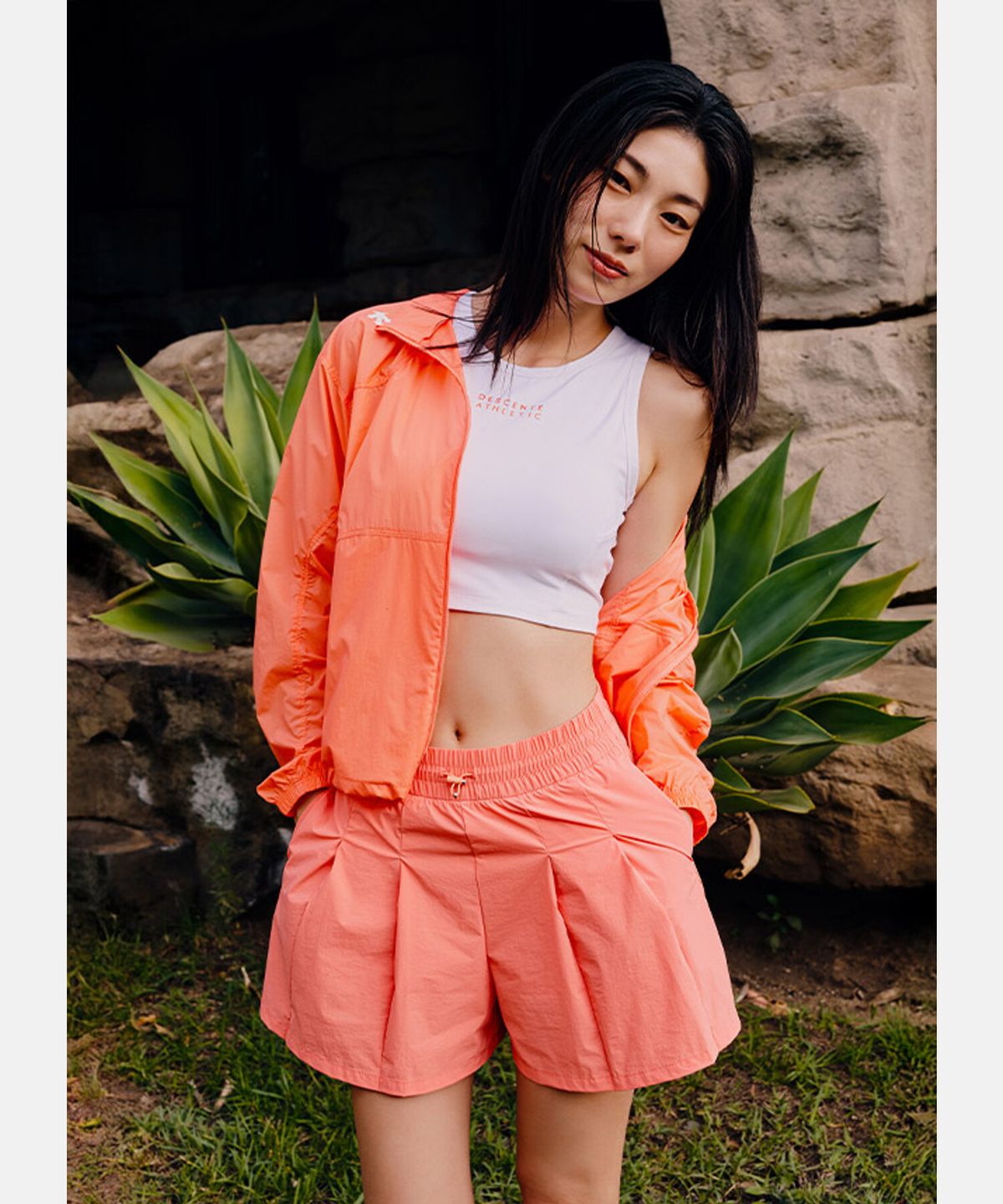 데상트(DESCENTE) 우먼스 4인치 이너 레깅스 웜업 쇼츠 오렌지 SR122PWP31
