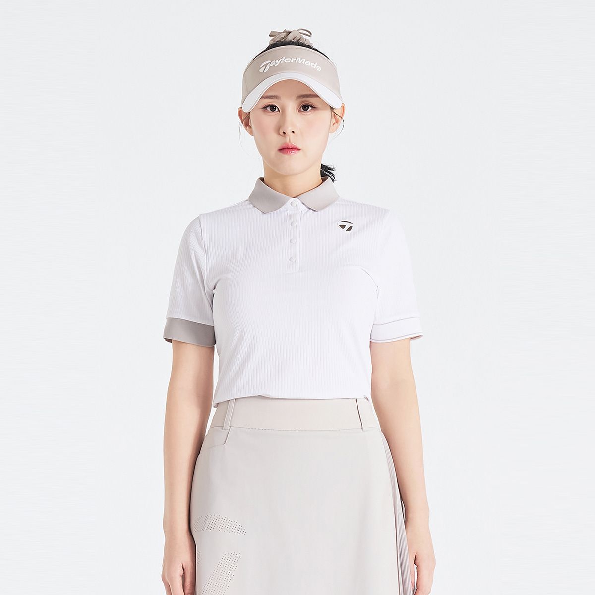 테일러메이드 어패럴(TAYLORMADE APPAREL) 26SS 여성 배색 골지 카라 반팔 티셔츠 TT6-61HG43-100
