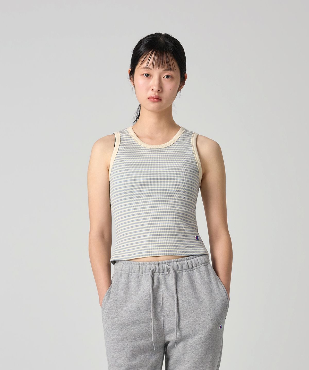 챔피온(CHAMPION) 여성 C로고 스트라이프 슬리브리스 Light Blue