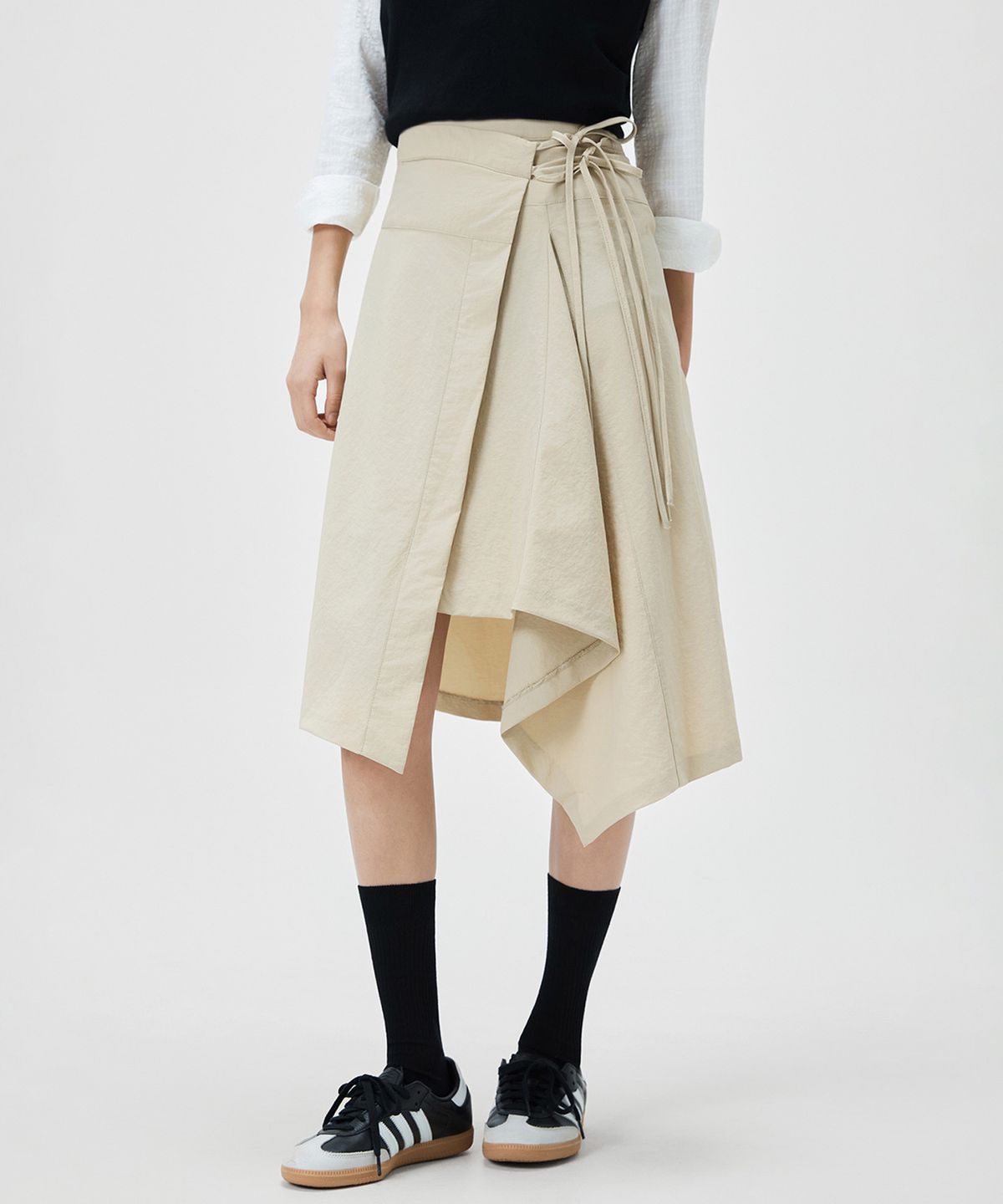미쏘(MIXXO) 나일론 랩미디 스커트_MIWWHG402B