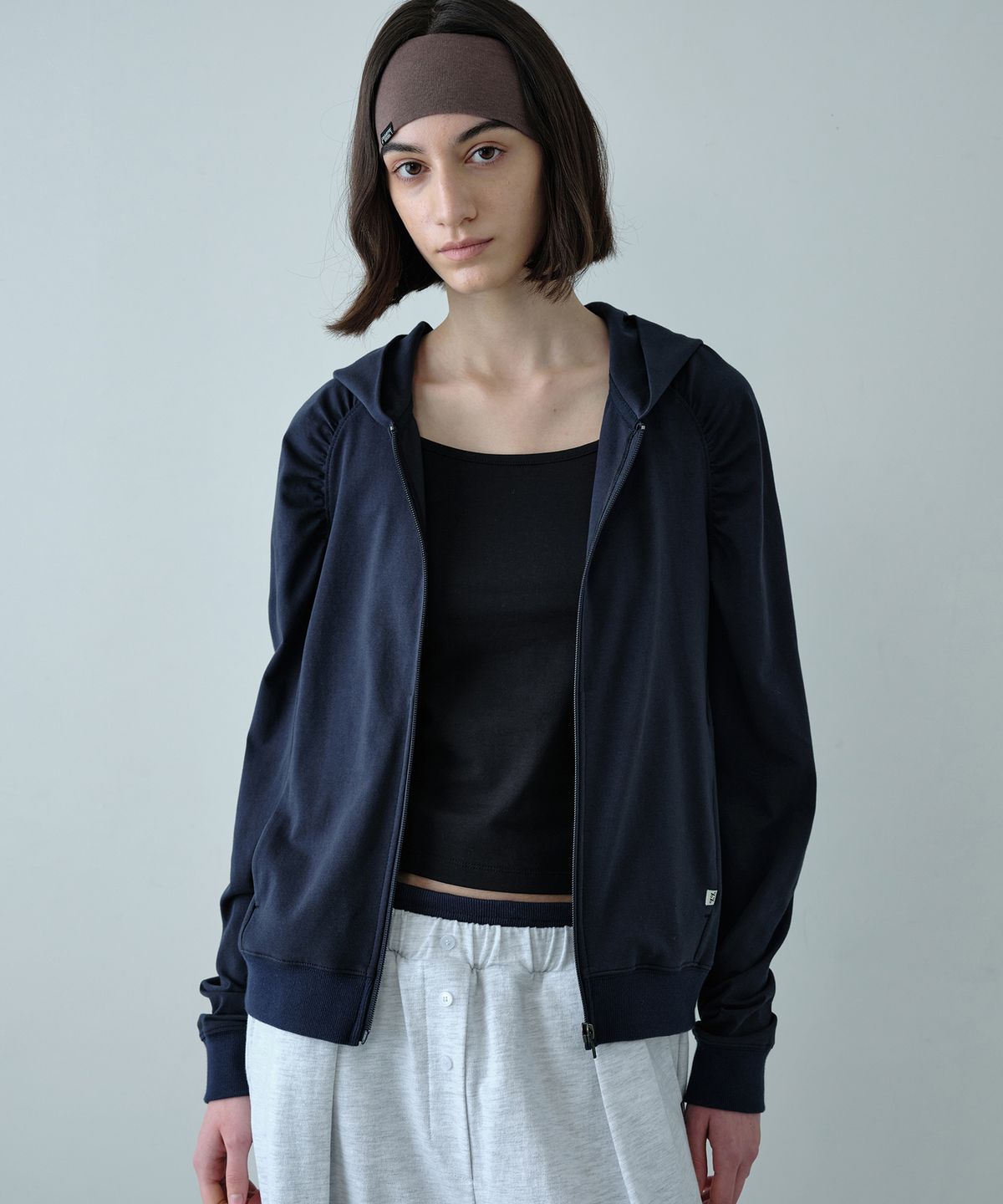시메트릭 퍼센트(SYMMETRICPERCENT) Shirring Zip-up Hoodie / Washed Navy