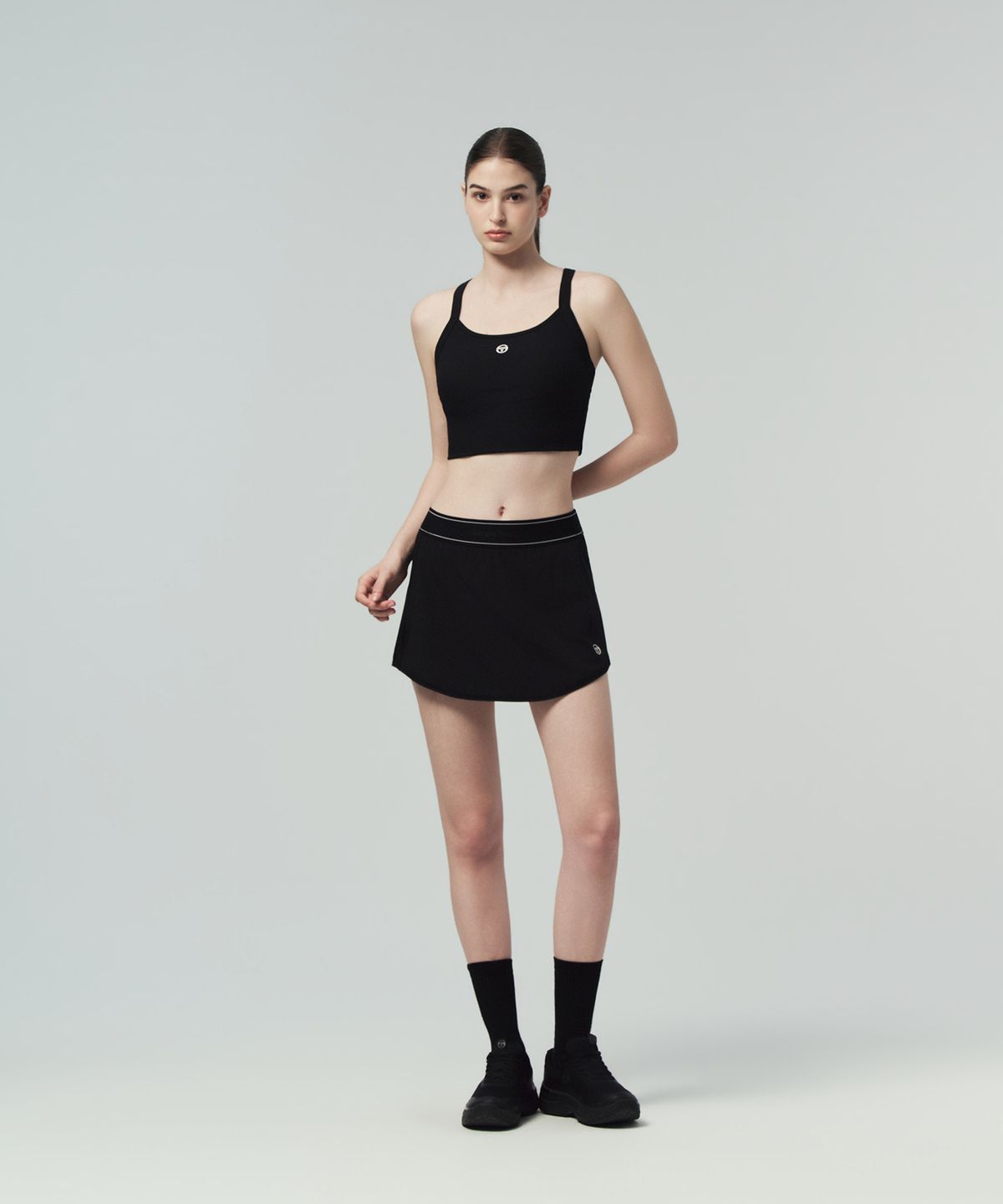 세르지오 타키니(SERGIO TACCHINI) W 경량 우븐 스커트 (Black)