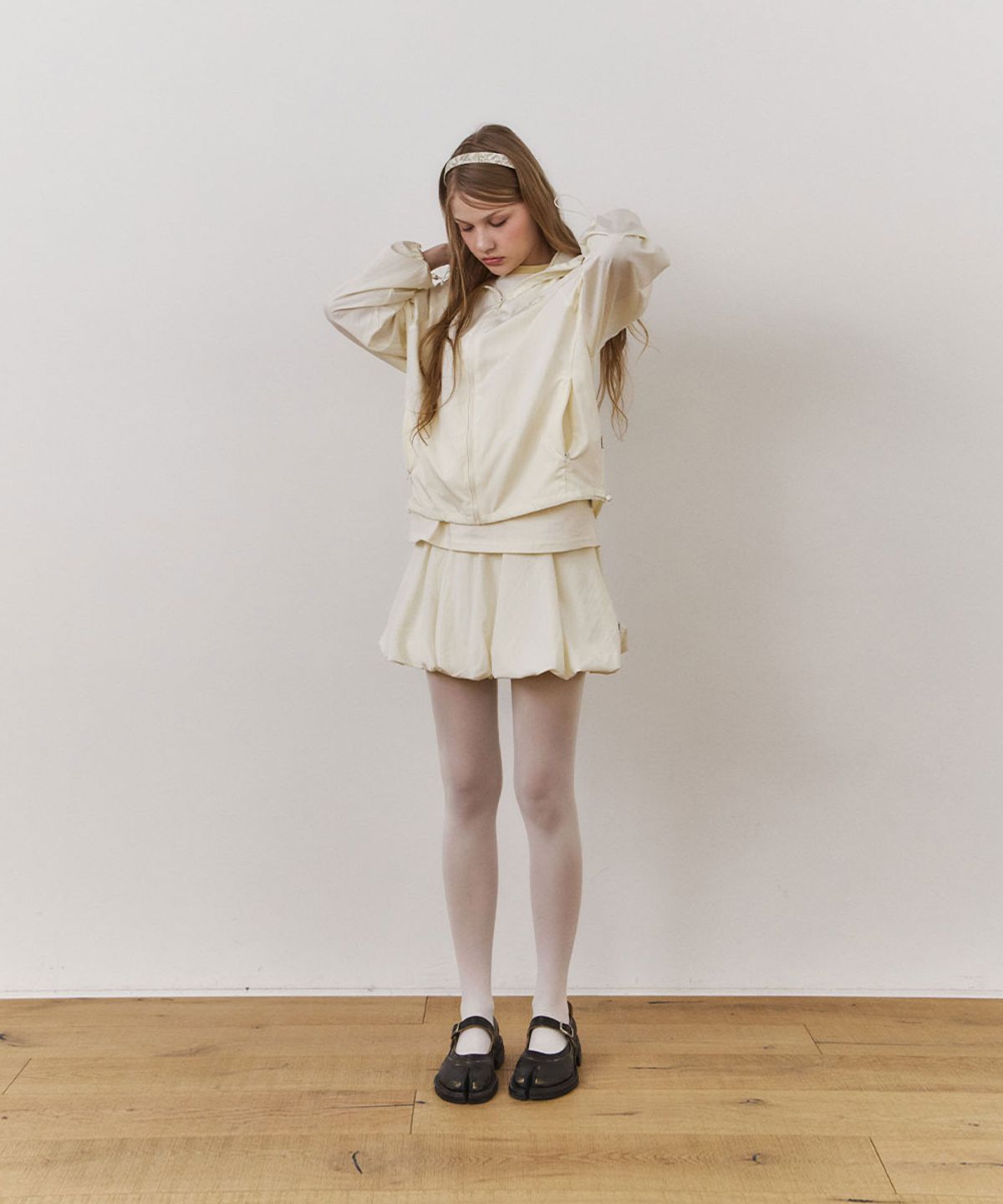 우네(OONE) Sheer Balloon Mini Skirt_Cream