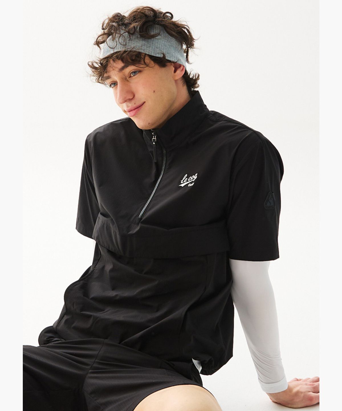 르꼬끄 골프(LECOQ GOLF) 남성 우븐 반집업 반팔 아노락 _BLCK GR121MBL31