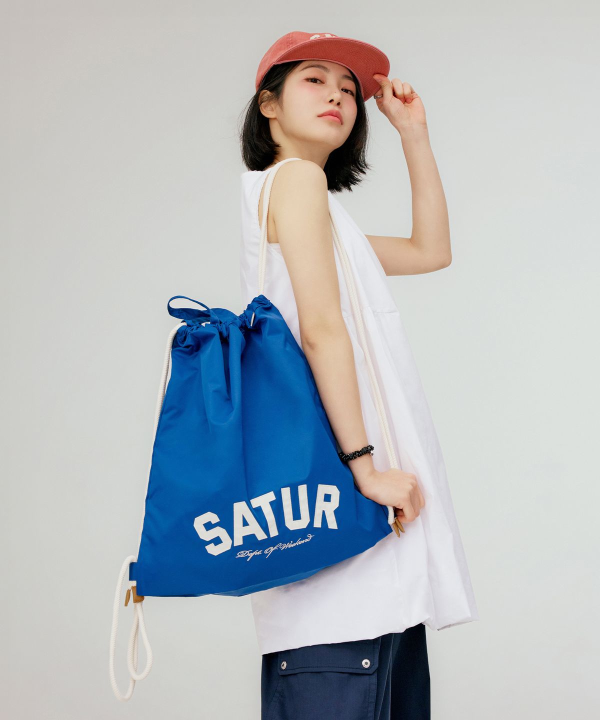 세터(SATUR) 나일론 드로우 스트링 백 블루