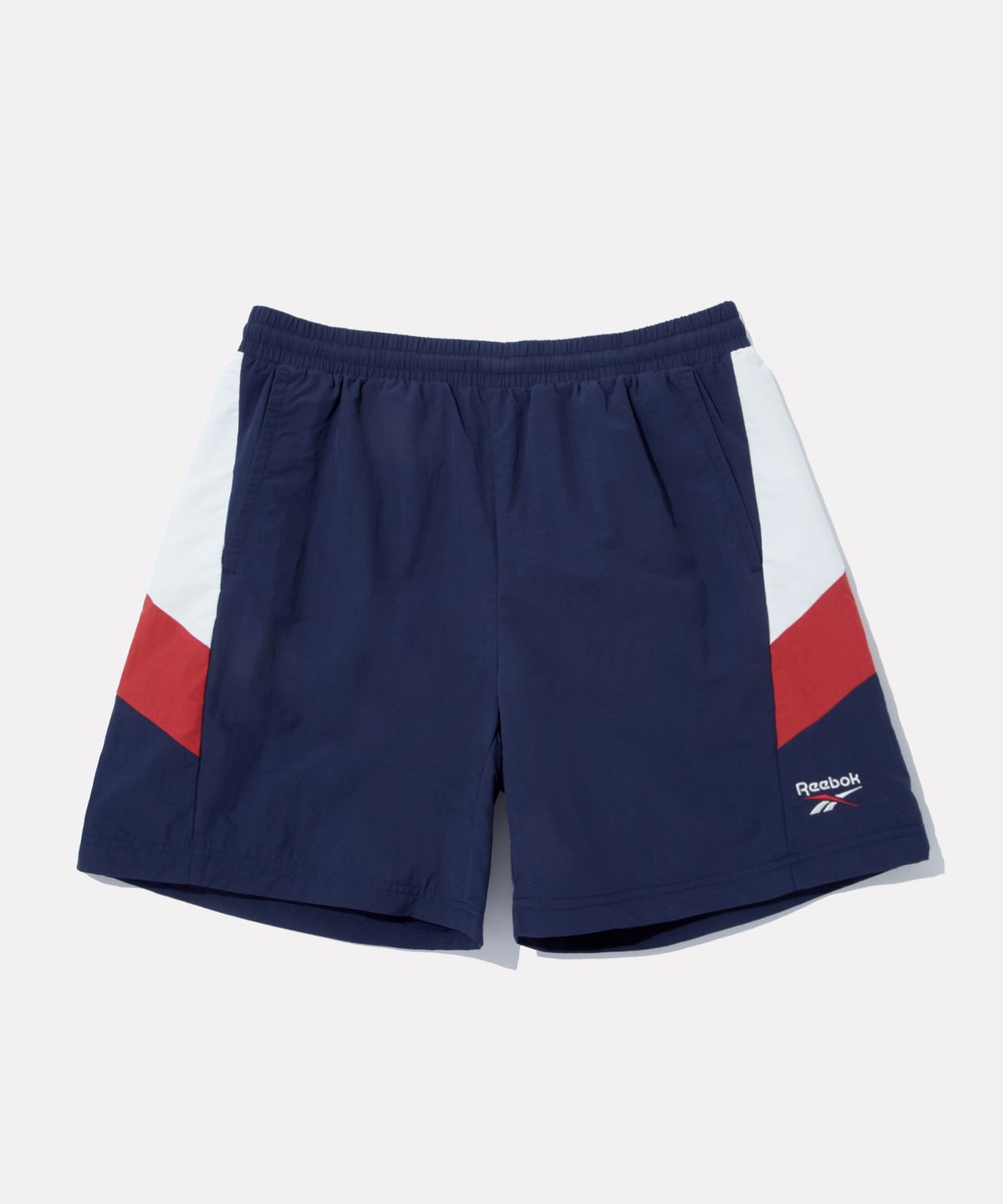 리복(REEBOK) DNA 컬러블록 쇼츠 - 네이비
