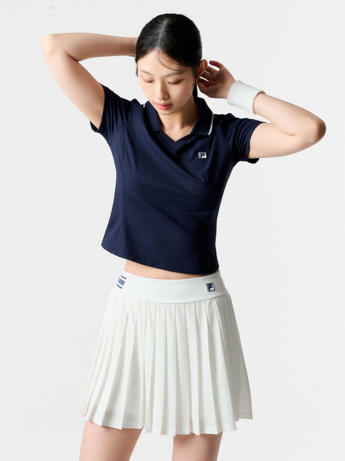 휠라(FILA) 테니스 여성 골지 크롭 카라 반팔티(FS262TS11F001472)