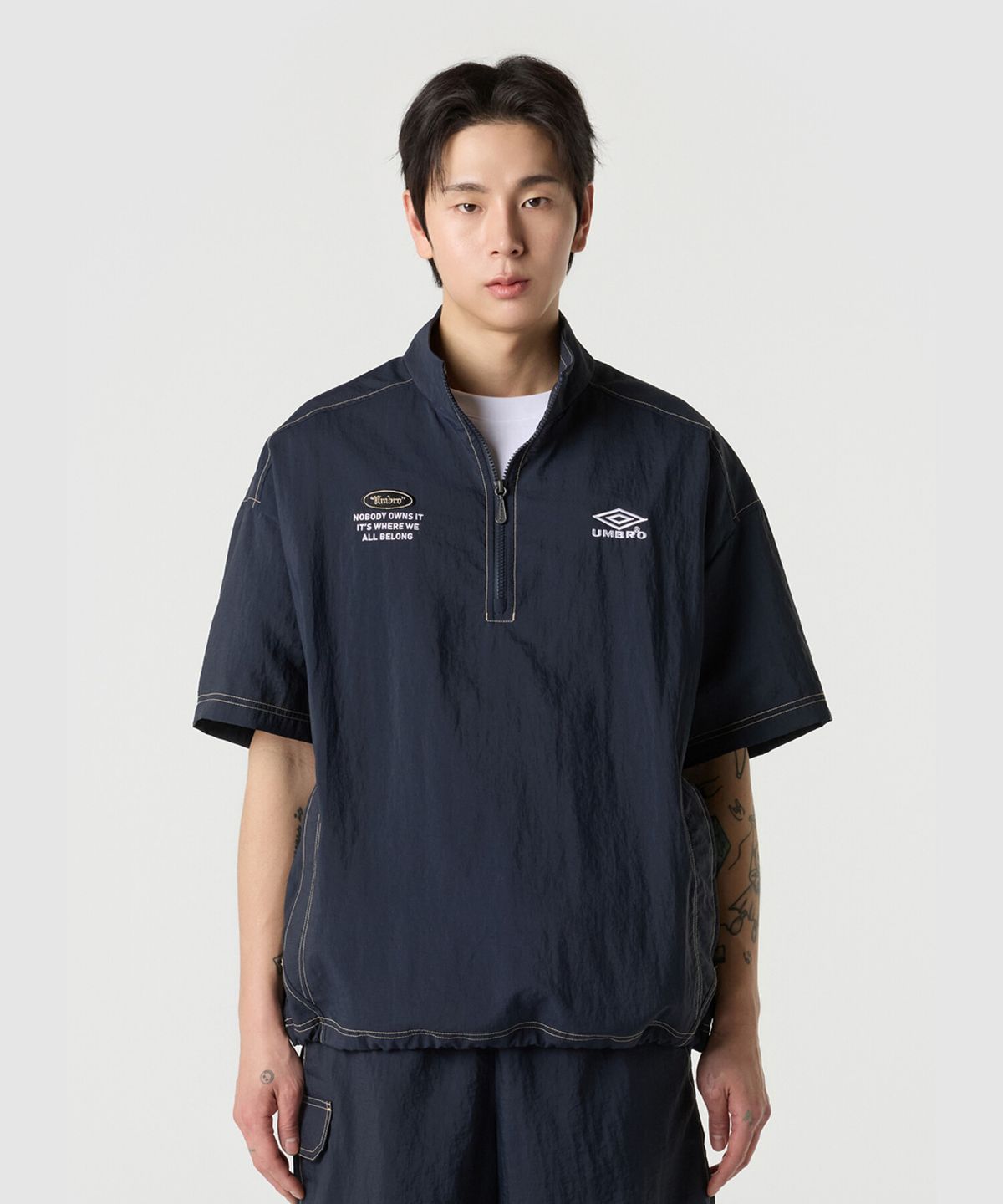 엄브로(UMBRO) 크리스피 타슬란 반팔 아노락 네이비 UR224CWT59