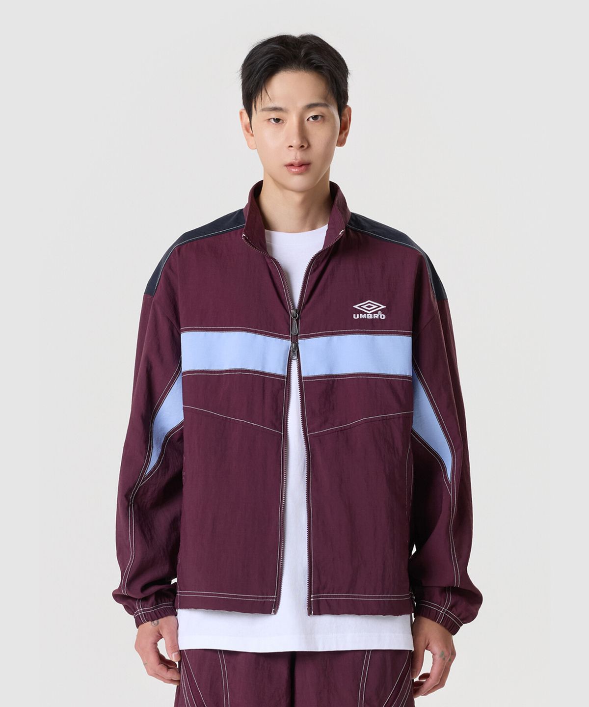 엄브로(UMBRO) 크리스피 타슬란 긴팔 바람막이 자켓 와인 UR224CJK59