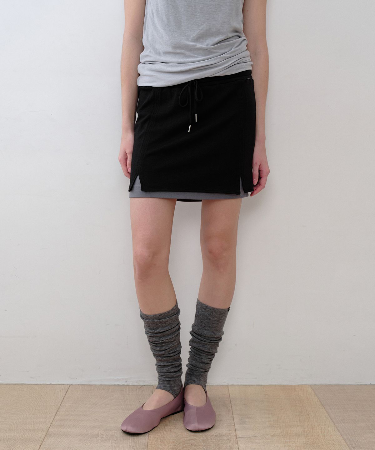 시메트릭 퍼센트(SYMMETRICPERCENT) Knitlike Layered Mini Skirt / Black