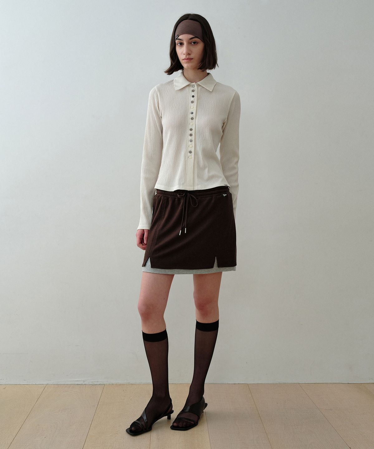 시메트릭 퍼센트(SYMMETRICPERCENT) Knitlike Layered Mini Skirt / Brown