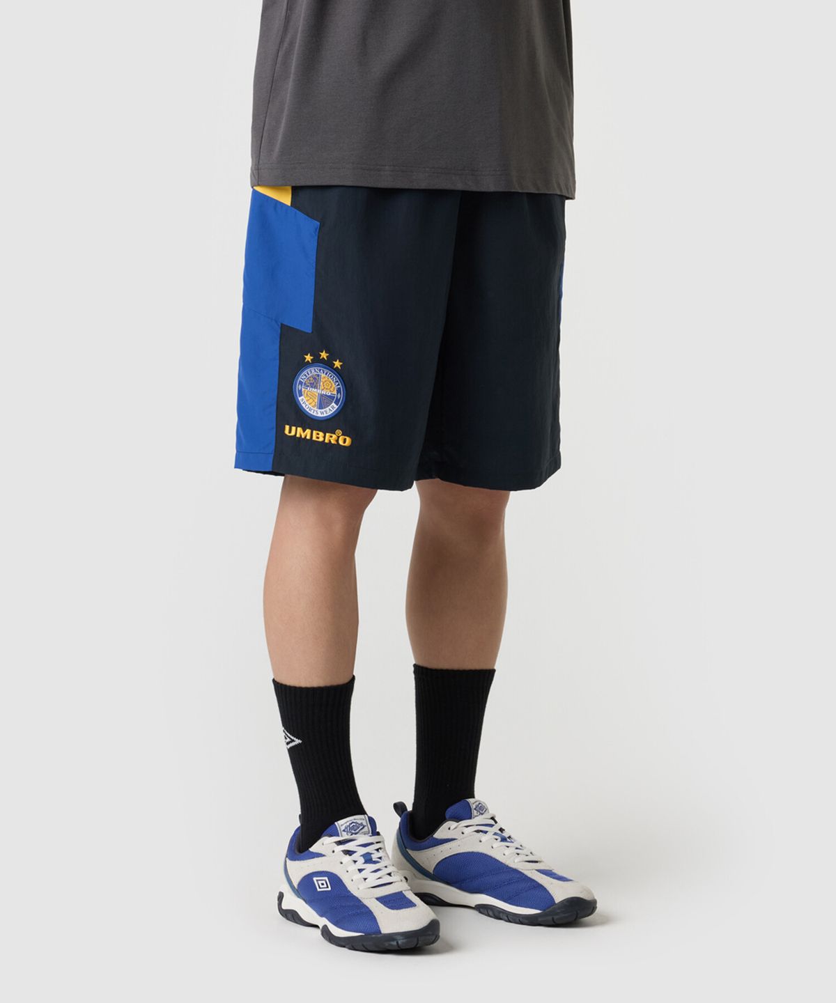 엄브로(UMBRO) HBL OG 컬러블럭 5부 반바지 네이비 UR221CHP56