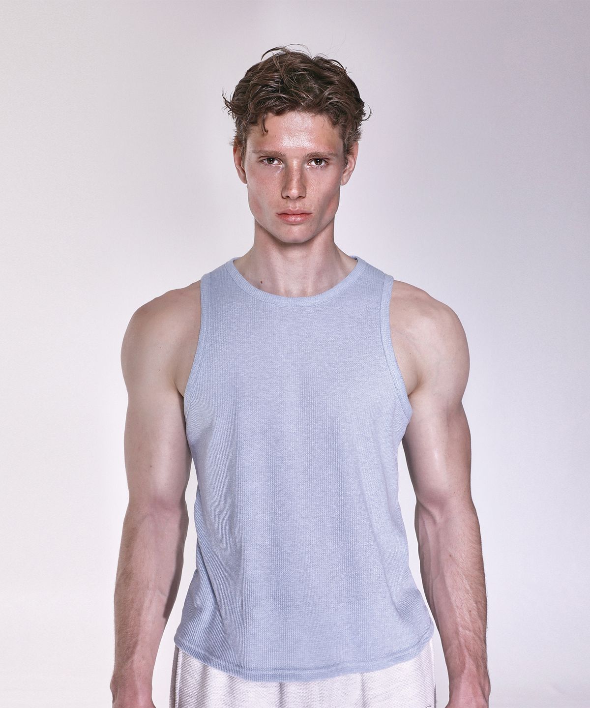 알브이디(RVD) (RRC CAMPAIGN) 크롭 러프와플 슬리브리스 (스카이블루)