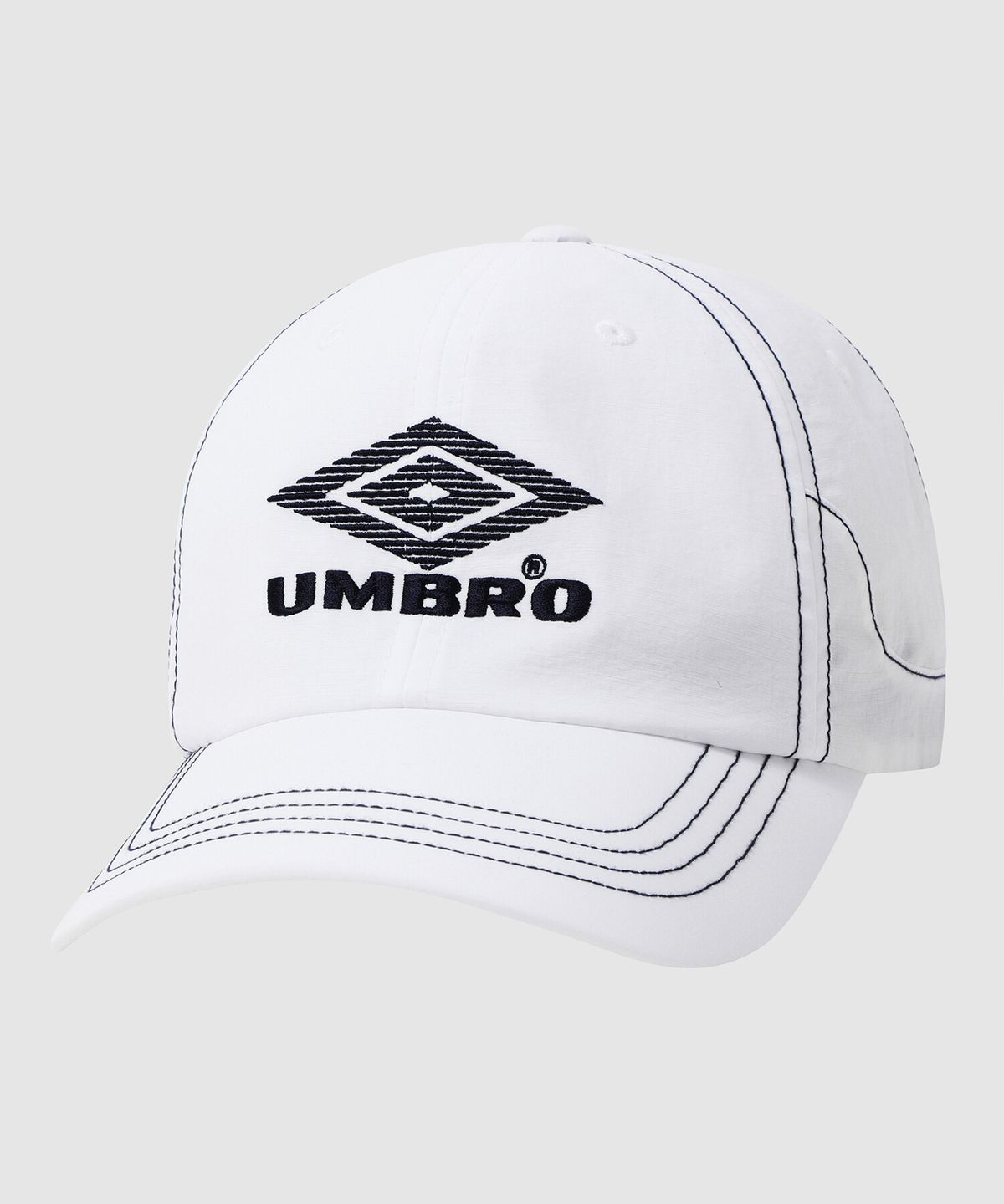엄브로(UMBRO) 크리스피 타슬란 캡 화이트 UR221CCP51