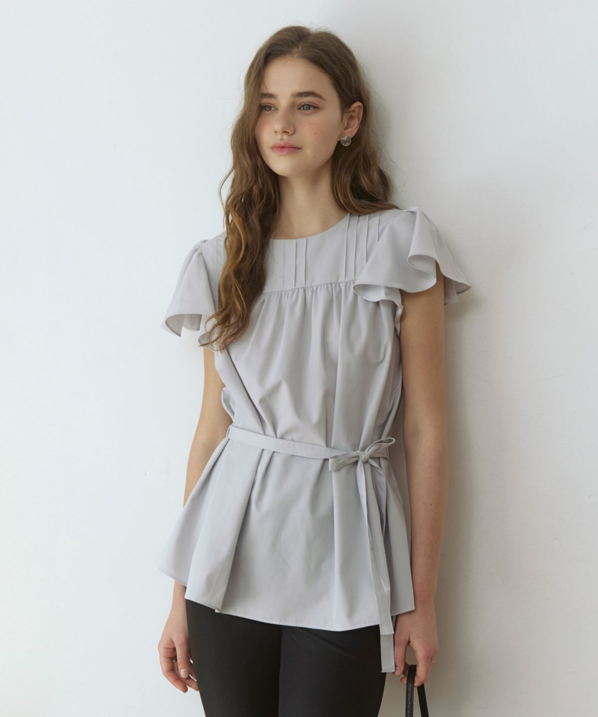 어다울(ADAUL) Pixie ruffle wing belted blouse - pale grey
