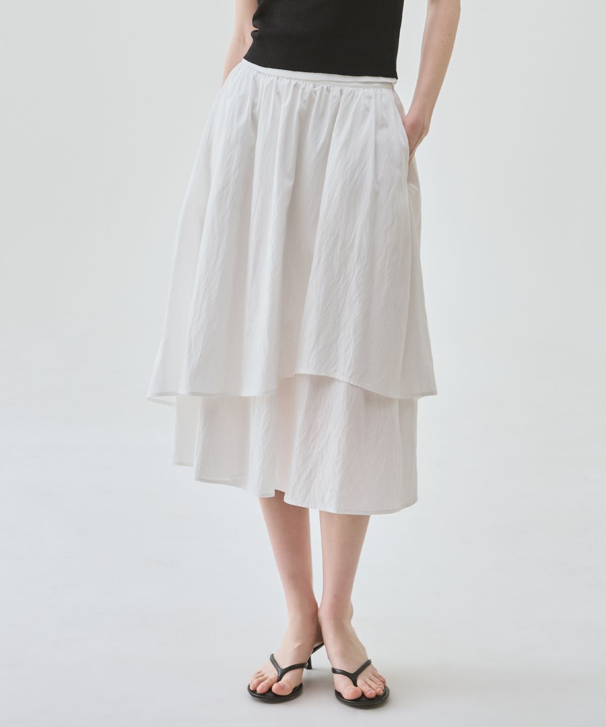 드로우핏 우먼(DRAWFIT WOMEN) 레이어 셔링 롱 플레어 스커트 [IVORY]