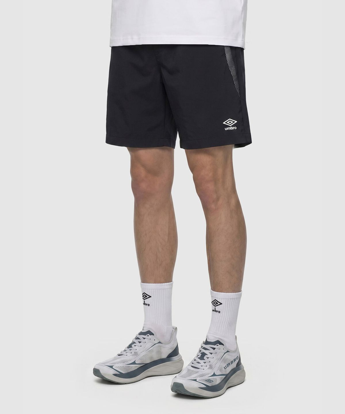 엄브로(UMBRO) [COOLING] 슬로우킥 냉감 4부 반바지 블랙 UR223SHP53