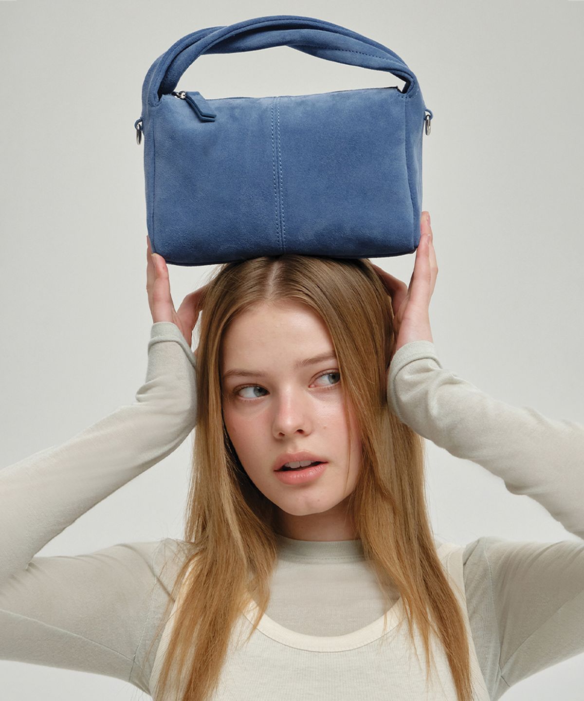 넛넛(NUTNUT) Nova Twist Strap Mini Bag - BLUE