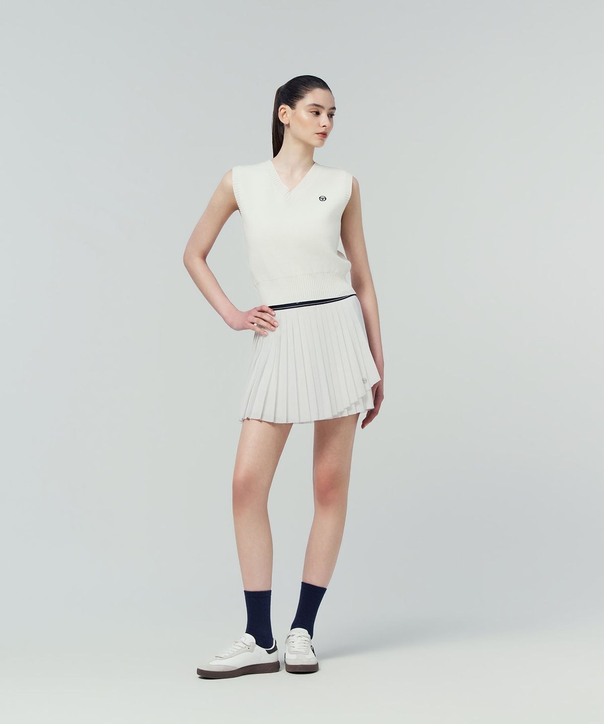 세르지오 타키니(SERGIO TACCHINI) W 플라잉 언밸런스 플리츠 스커트 (White)