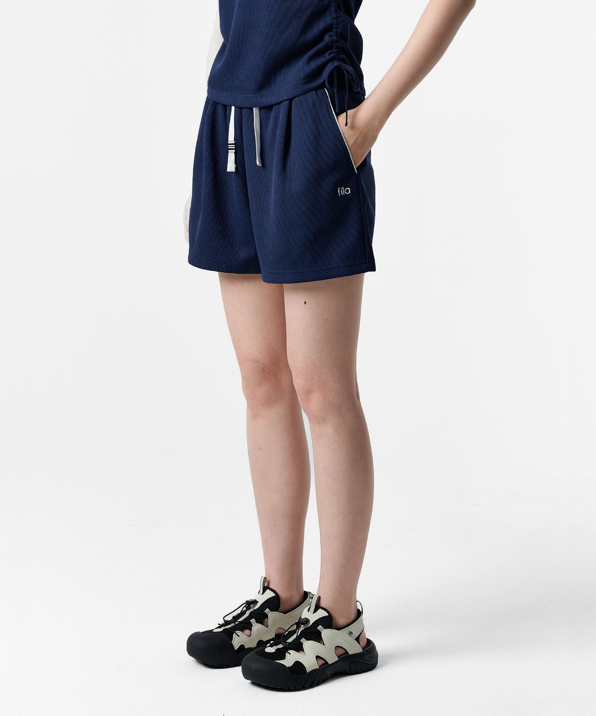휠라(FILA) 여성 와플 트레이닝 쇼츠(FS262TR02F006472)