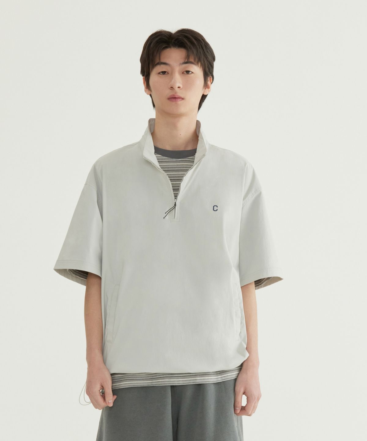 커버낫(COVERNAT) 나일론 하프집업 티셔츠 라이트그레이