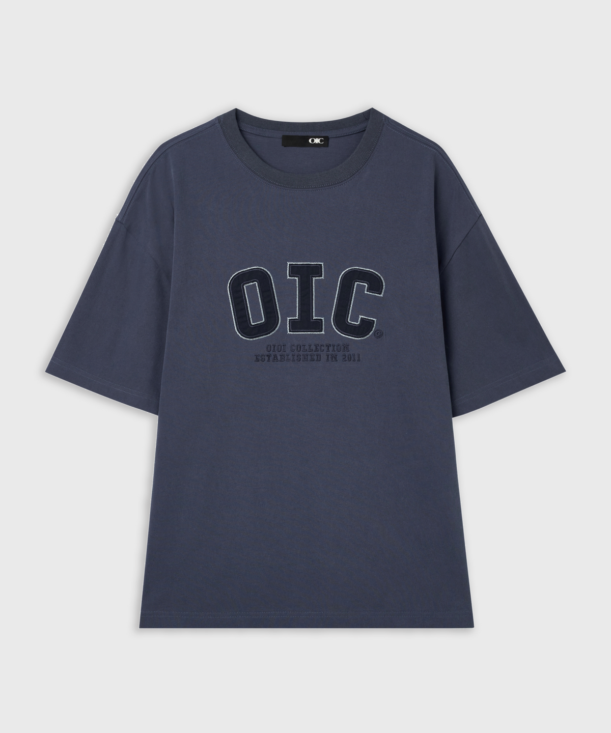 오아이오아이 컬렉션(OIOI COLLECTION) 빅로고 피그먼트 오버핏 반팔 티셔츠 [NAVY]