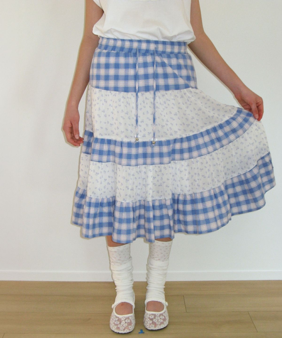 론론(RONRON) FLORAL CHECK PATCHWORK MID SKIRT BLUE