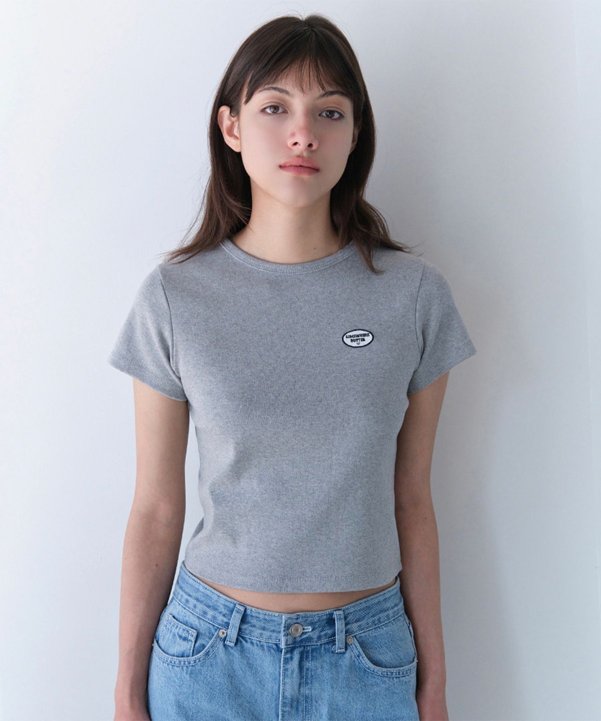 썸웨어버터(SOMEWHEREBUTTER) Cost Wappen Top - Grey