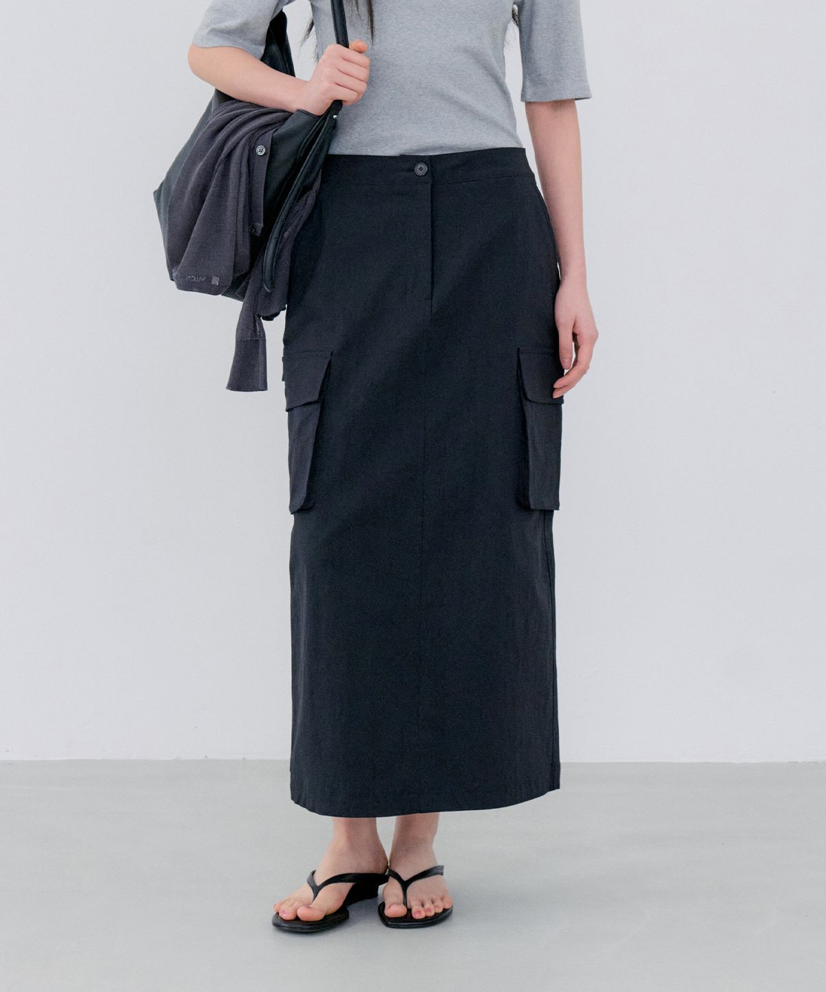 노티아(NOTIA) ANORAK CARGO SKIRT - BLACK