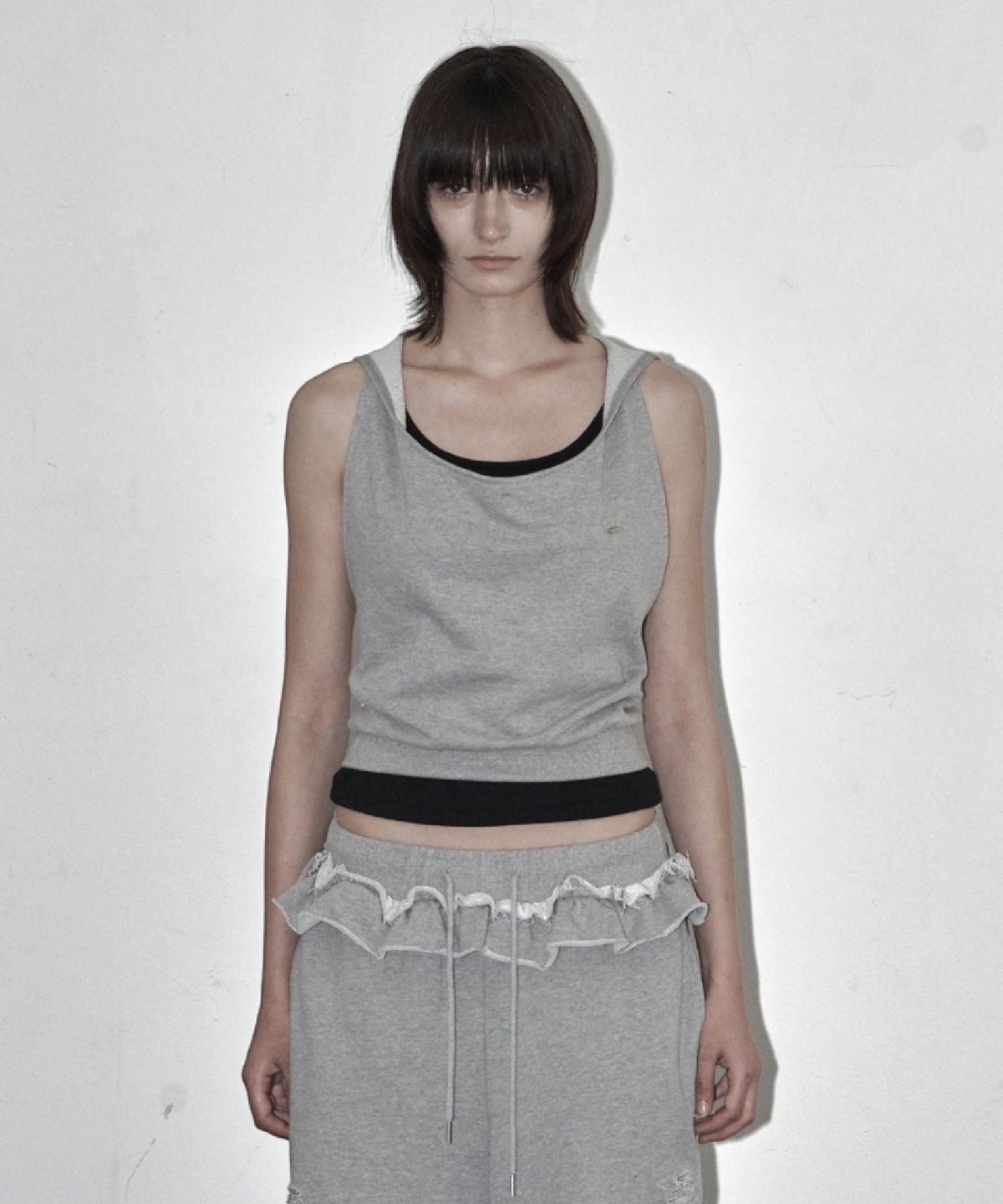 시너진(SYNERJYN) DRAPED HOODED SWEAT TOP MELANGE