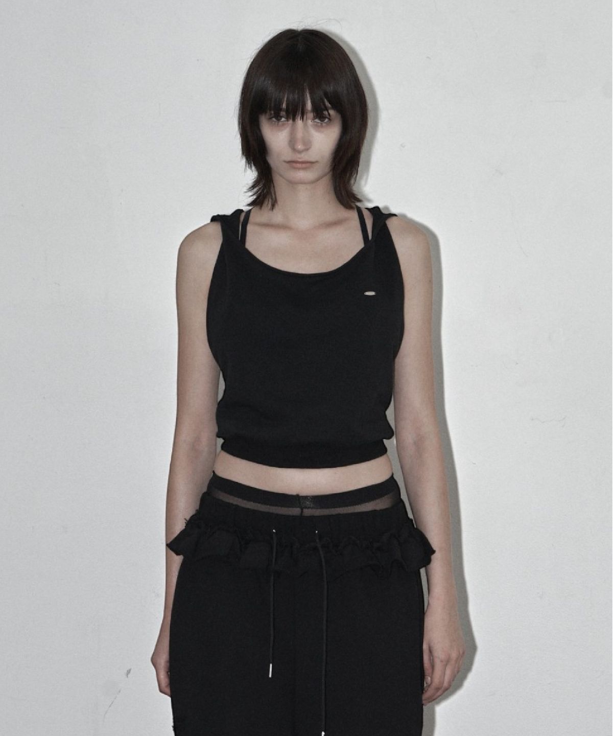 시너진(SYNERJYN) DRAPED HOODED SWEAT TOP BLACK