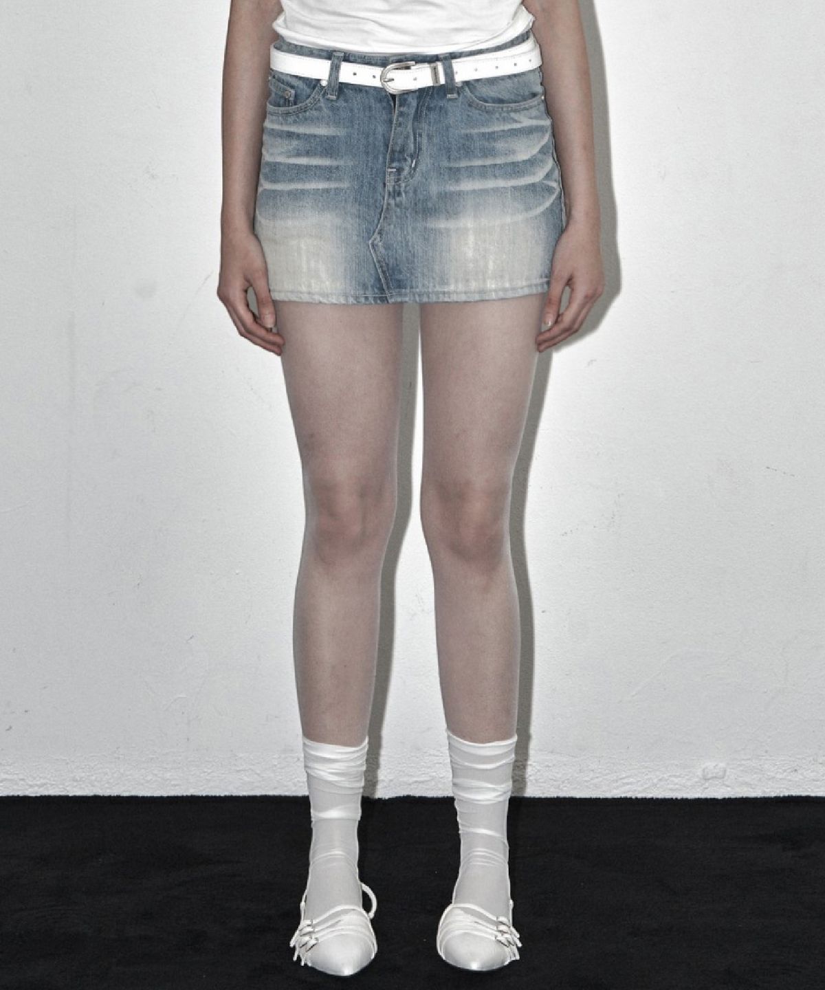 시너진(SYNERJYN) CAT WASHING MINI SKIRT LIGHT BLUE