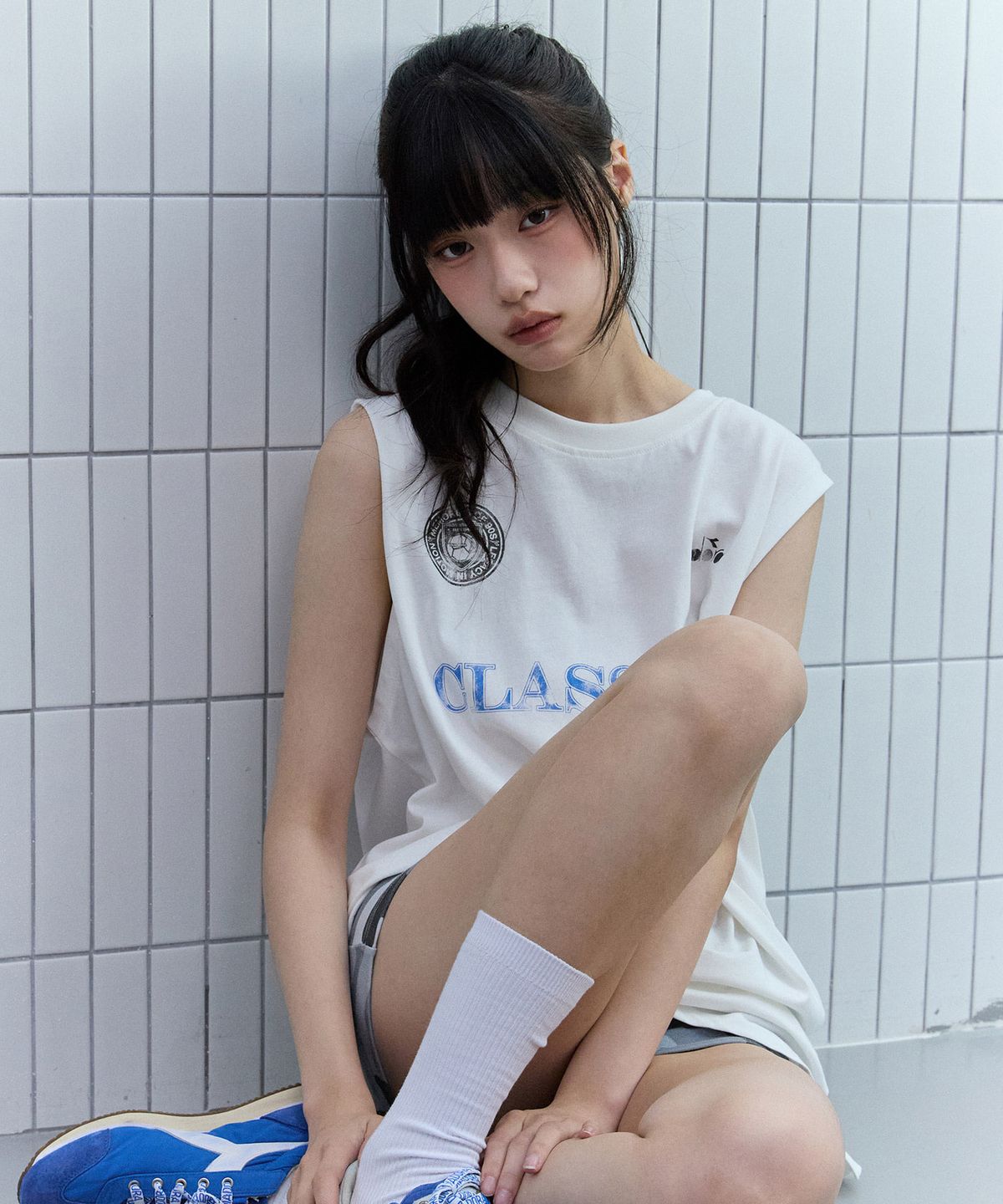 디아도라(diadora) 워싱 그래픽 슬리브리스 OFF WHITE