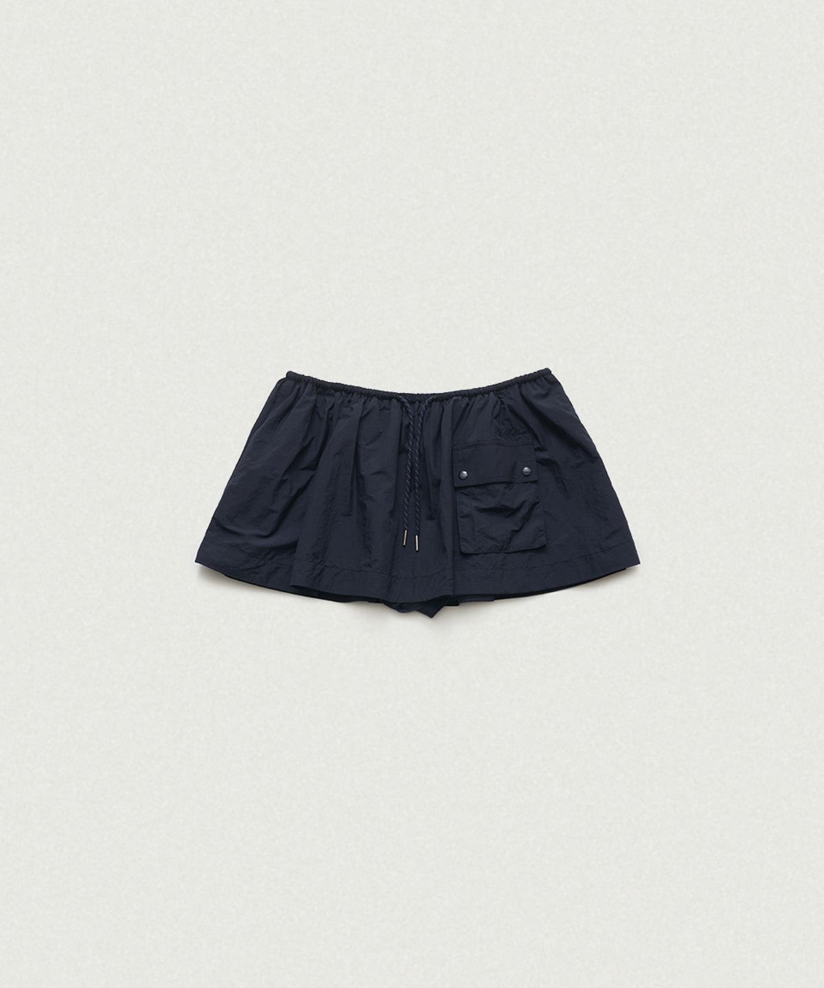 더바넷(THEBARNNET) Leon Wind Drawstring Skirt_Navy